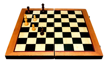 wooden chess board isolated on white backgroundの写真素材