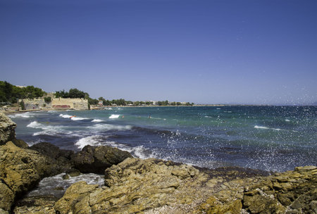 Mediterranean sea summer beach with waves in the Greece