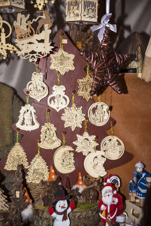 showcase big christmas tree with wooden toysの写真素材