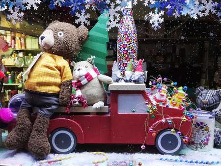 christmas truck with toys and big good bearの写真素材