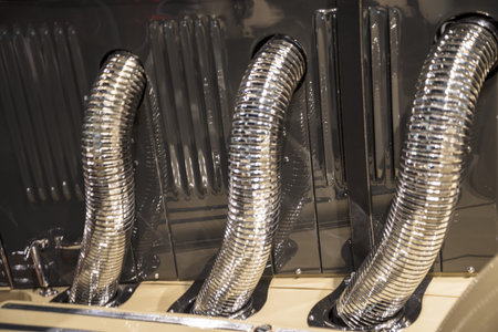 Stuttgart, Germany - December 13, 2017: Mercedes-Benz Museum - Engine pipes - close up. .Car Model...