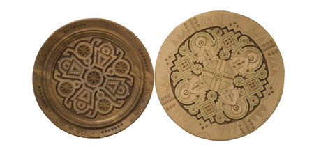 two traditional Ukrainian decorative wooden plates, rune workの写真素材