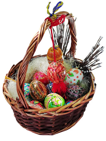 Easter. Painted eggs in traditional Ukrainian style in a basket for holiday decoration.の写真素材