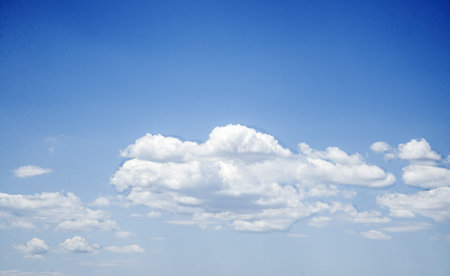 Background of spring blue sky with clouds