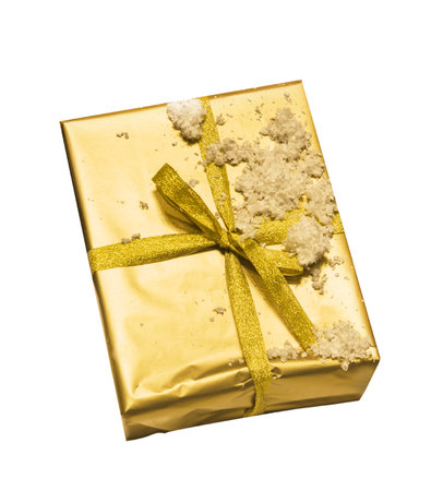 gift gold box with gold bow isolated on the white backgroundの写真素材