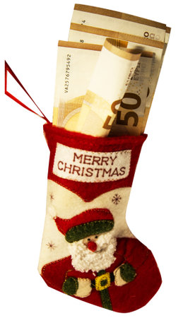 Christmas sock with euro isolated on white backgroundの写真素材