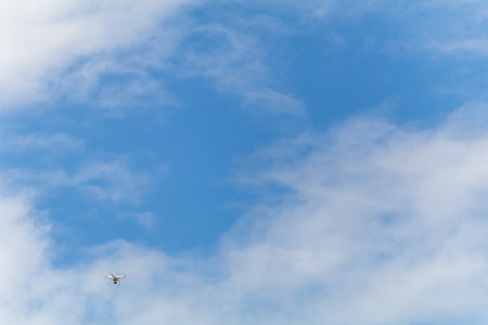 Drone flying in the blue sky.の写真素材
