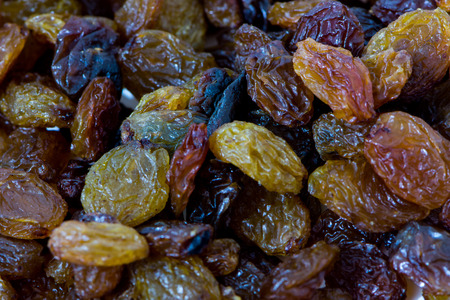 closeup shoot of the pile of organic dry raisinsの写真素材