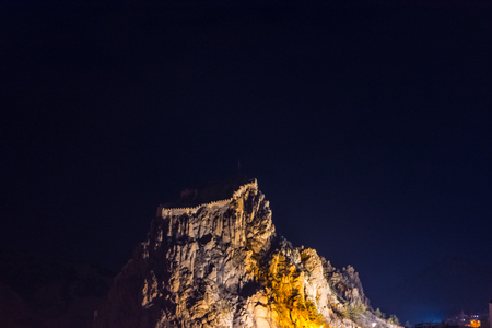 Old lighten ruined forth of Afyonkarahisar located on a very high cliff overlooking the city of Afyonの写真素材