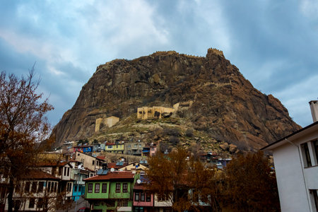 Ottoman and famous houses street with the Karahisar castle in the background