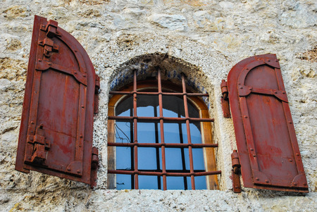 Window of the small house in city of Blagajの写真素材