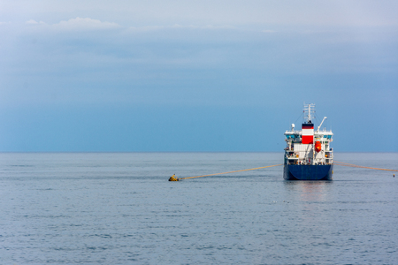 The anchored cargo ship in the Black sea in Turkeyの写真素材