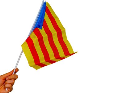 catalonia flag held on the white background isolatedの写真素材