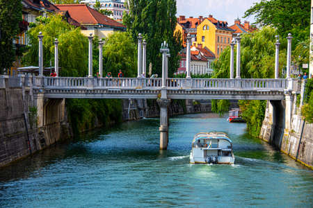 Beautiful landscape of Ljubljanica river flowing in the center of Ljubljana capital city of Slovenia one european country, 2019.07.26のeditorial素材