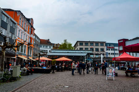 Street with many bars, restaurants, pizzeria and coffee shops in Herfordのeditorial素材