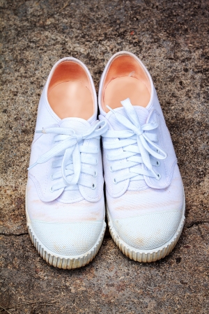 Shoes white students  Neatly tied with ropes の写真素材