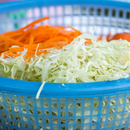 cabbage and Carrot cut in Basket の写真素材