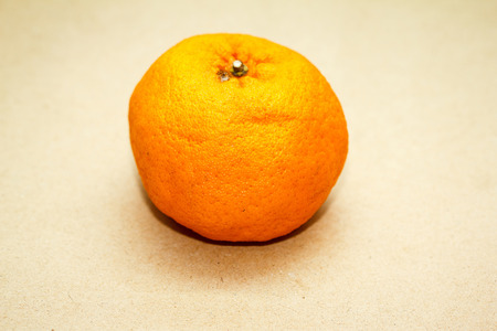 Oranges Put on a brown backgroundの写真素材