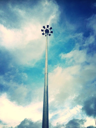 Pole spotlight in sky background.の素材