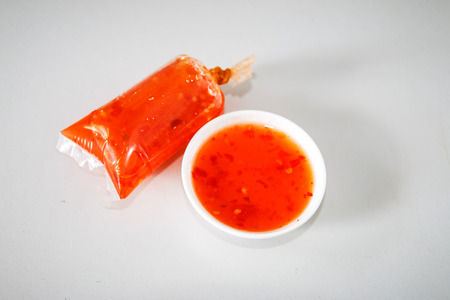spicy sauces in bowls  on white  background の写真素材