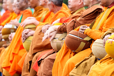 Satun, Thailand - December 30, 2014, at 07.30 AM: public offering food to monks. On the eve of the New Year to be reached. In Satun, Thailand will have merit by giving food to monks held annually.のeditorial素材