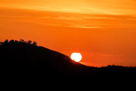 sunsets over the mountainsの写真素材