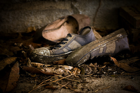 Still Light old shoes that were left on the floor.の写真素材