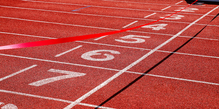 Finish line on the track in the stadium.の写真素材