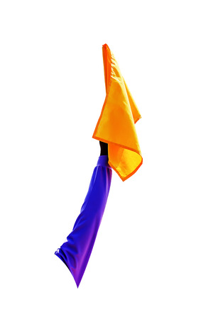 Yellow flag indicates readiness. In athleticsの写真素材