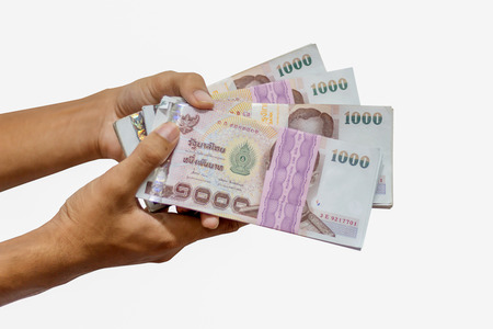 Close up of 1000 bath Thai money on hand. ,Banknotes Thailandの写真素材