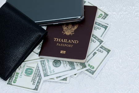 Wallet,Thailand passport and dollar : concept for tourismの写真素材