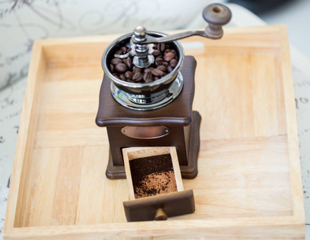 Coffee grinder with coffee beansの写真素材