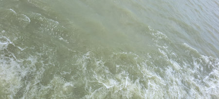 Waves on the surface of the water in the river, backgroundの写真素材