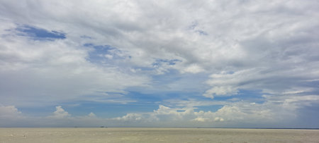 clouds in the blue sky over the sea, panoramic viewの写真素材