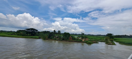 Panoramic view of the river and the blue sky with cloudsの写真素材