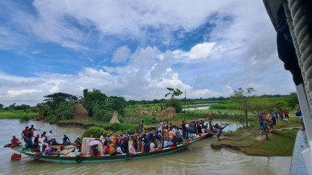 Unidentified Thai people travel by boat to visit rice field in Ratchaburi, Thailand.の写真素材