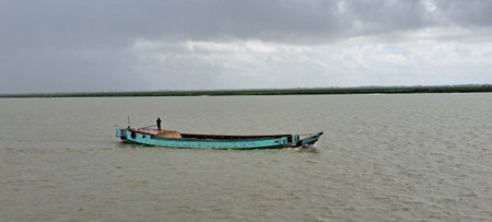 fisherman boat on the Mekong river in Vietnam, Asiaの写真素材