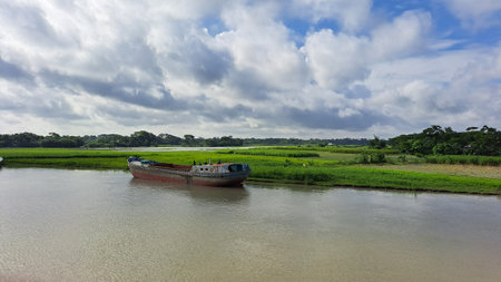 Fishing boat on the river in the countryside of Sri Lanka.の写真素材