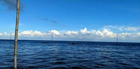 Seascape with blue sky and white clouds. Seascape with blue sky and white clouds over the ocean.の写真素材