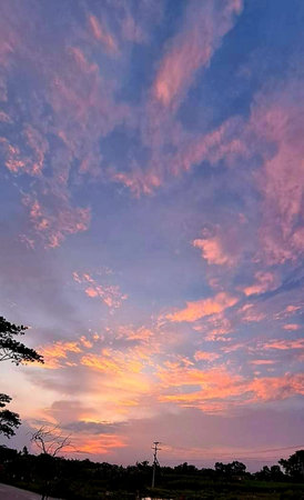 Sunset in the countryside of Thailand, beautiful sky with clouds.の写真素材
