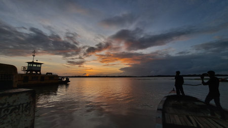 Sunset on the Mekong river in Laos, Southeast Asia.の写真素材