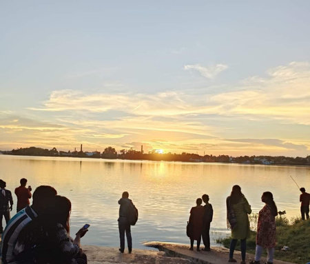Unidentified people on the banks of the Kolkata River at sunsetの写真素材