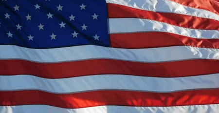American flag waving in the wind. United States of America flag.