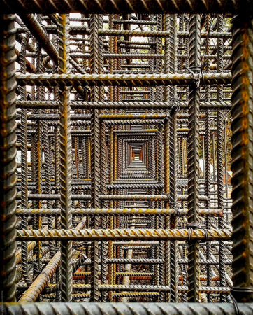 Construction site of a new residential complex, scaffolding and steel reinforcement