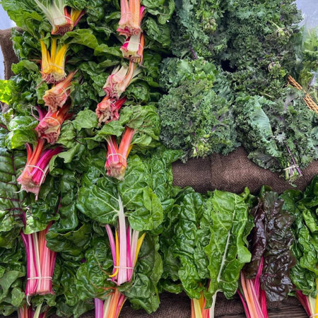 Bunch of fresh organic chard on wooden background. Healthy food concept.