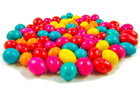 Closeup of colorful chocolate candies on white