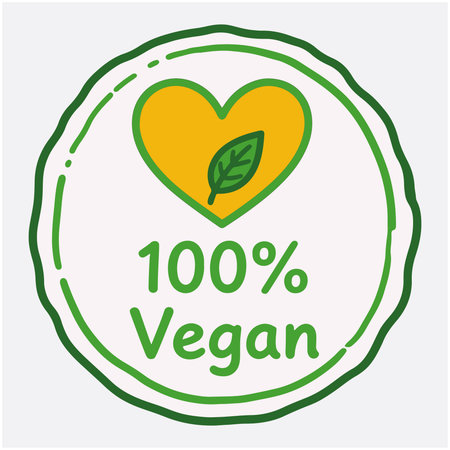 100 percent vegan  with green heart and leaf symbolのイラスト素材