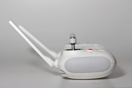 a close up of detailed white drone remote parts isolated on white background. drone camera photo concept.の写真素材