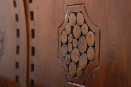 a close up of decorative detail on a wooden chair with a natural pattern. furniture photo concept.