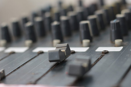 black mixer amplifier detail photo. audio equipment concept photo. Selected focus.
